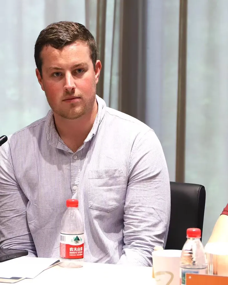 Blake Harkness speaking at an AI event in New Zealand